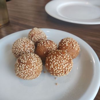Iron Wok - Sesame balls- can be devoured as an appetizer or a dessert, centre filled with creamy gooey bean paste, crunchy on the outside. - Chinese Near Me - Pullman, Washington Iron Wok - Sesame balls- can be devoured as an appetizer or a dessert, centre filled with creamy gooey bean paste, crunchy on the outside. - Chinese Near Me - Pullman, Washington
