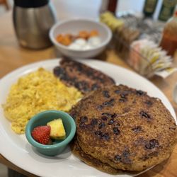 Skillets Restaurant - Seasonal ginger & cranberry pancakes w/ chicken sausage and eggs! Deelish!