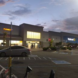 a shopping cart in a parking lot a shopping cart in a parking lot
