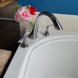 New faucet hardware. Behind/under the tub, new pipe connections and gaskets.