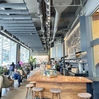 Starbucks - mix of comfy lounge chairs, counter top , and communal tables - Coffee & Tea Near Me - Vancouver, British Columbia