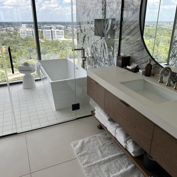 Thompson Houston - Bathroom with tub and shower. Wow this is what I wish my house had. - Hotels Near Me - Houston, Texas