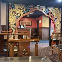 Inside dining area facing register.