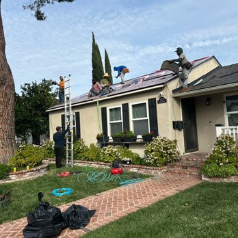 Sky Solar Pro - Roofers hard at work! - Solar Installation Near Me - Burbank , California