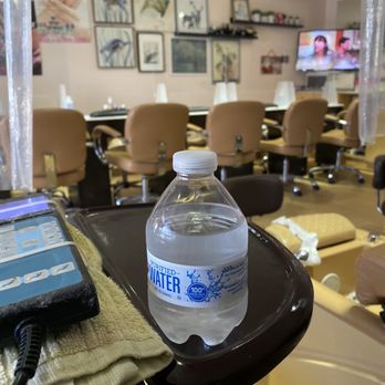 A&j Coco Nail & Spa - Water given out during a pedicure - Nail Salons Near Me - Bellport, New York
