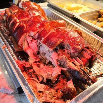 Pistahan - Lechon under the heat lamp - Filipino Near Me - San Leandro, California Pistahan - Lechon under the heat lamp - Filipino Near Me - San Leandro, California