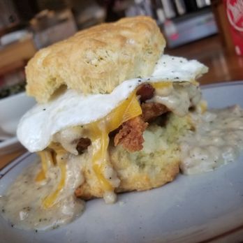 Pine State Biscuits - The reggie delux (fried chicken, cheese, bacon, fried egg and sausage gravy) - Breakfast & Brunch Near Me - Portland, Oregon Pine State Biscuits - The reggie delux (fried chicken, cheese, bacon, fried egg and sausage gravy) - Breakfast & Brunch Near Me - Portland, Oregon