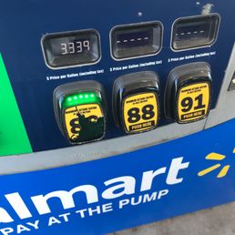 gas pumps at a gas station gas pumps at a gas station