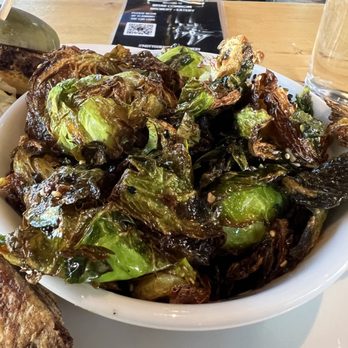 Briar Common Brewery + Eatery - CRISPY BRUSSELS SPROUTS - CRISPY GARLIC, BLACK SESAME, WHITE SOY, SRIRACHA (V) - New American Near Me - Denver, Colorado Briar Common Brewery + Eatery - CRISPY BRUSSELS SPROUTS - CRISPY GARLIC, BLACK SESAME, WHITE SOY, SRIRACHA (V) - New American Near Me - Denver, Colorado