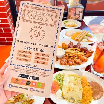 Taqueria Taxco - a person holding up a menu - Tacos Near Me - Mesquite, Texas Taqueria Taxco - a person holding up a menu - Tacos Near Me - Mesquite, Texas