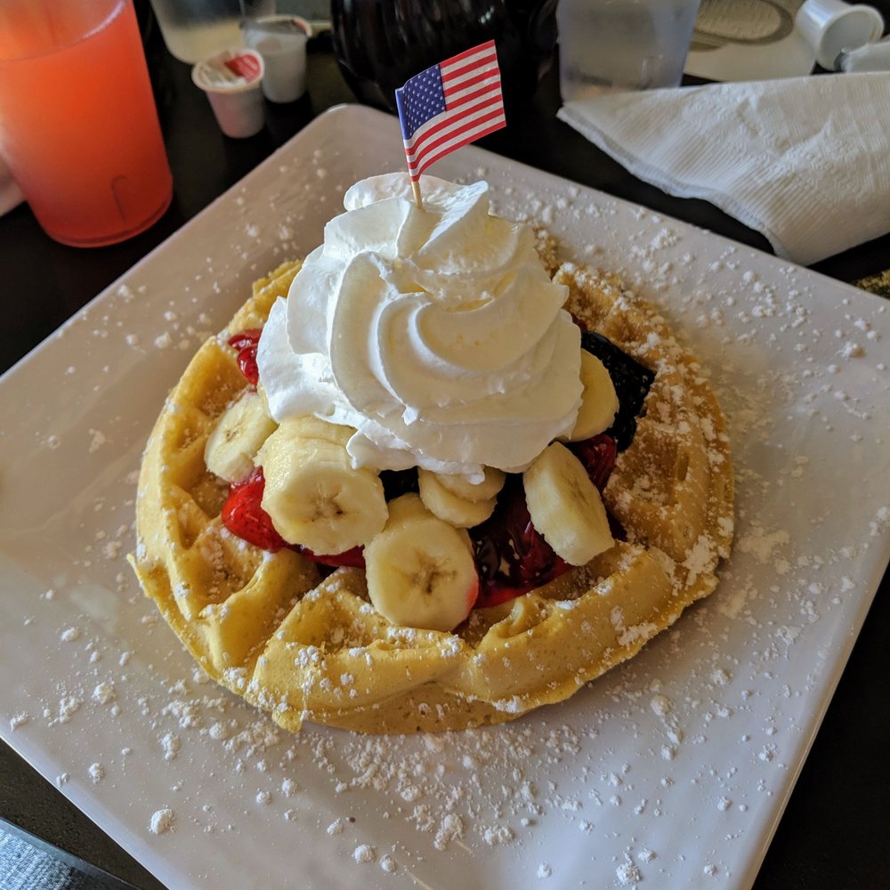 Wally Waffle - The Patriot. Belgian waffle with blueberries, strawberries, and whipped cream. Yum! - Breakfast & Brunch Near Me - Akron, Ohio Wally Waffle - The Patriot. Belgian waffle with blueberries, strawberries, and whipped cream. Yum! - Breakfast & Brunch Near Me - Akron, Ohio