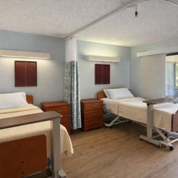 Professional Post Acute Center - Bright, comfortable patient room designed for rest, healing, and quality care.