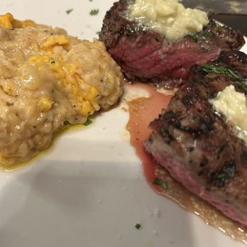 Manning’s Steaks And Spirits - New York strip and fillet next to the gratin potatoes - Steakhouses Near Me - Littleton, Colorado