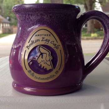 Another Broken Egg Cafe - Saw the table beside us had these purple coffee mugs, first time here, HAD to have one! So, asked server to add it to our bill. - Breakfast & Brunch Near Me - Indianapolis, Indiana Another Broken Egg Cafe - Saw the table beside us had these purple coffee mugs, first time here, HAD to have one! So, asked server to add it to our bill. - Breakfast & Brunch Near Me - Indianapolis, Indiana