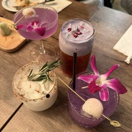 Ube Thai iced tea is in the long cup Ube Thai iced tea is in the long cup