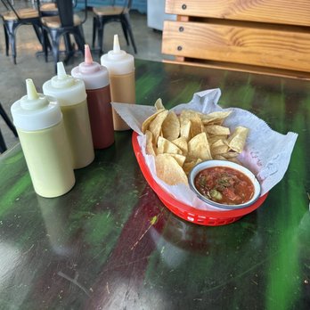 Tacos el Patron - Chips and salsa and 4 sauces ranging from mild (left) to hot (right) - Tacos Near Me - Cypress, Texas Tacos el Patron - Chips and salsa and 4 sauces ranging from mild (left) to hot (right) - Tacos Near Me - Cypress, Texas