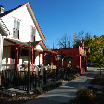 Ned Kelly's Irish Pub - It appears that the white house to the north of the bar is somehow also part of Ned's. - Sports Bars Near Me - Downtown Littleton, Colorado