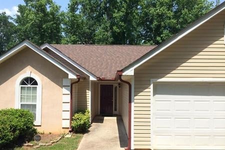 Slide of Palace Roofing Restoration & Gutters