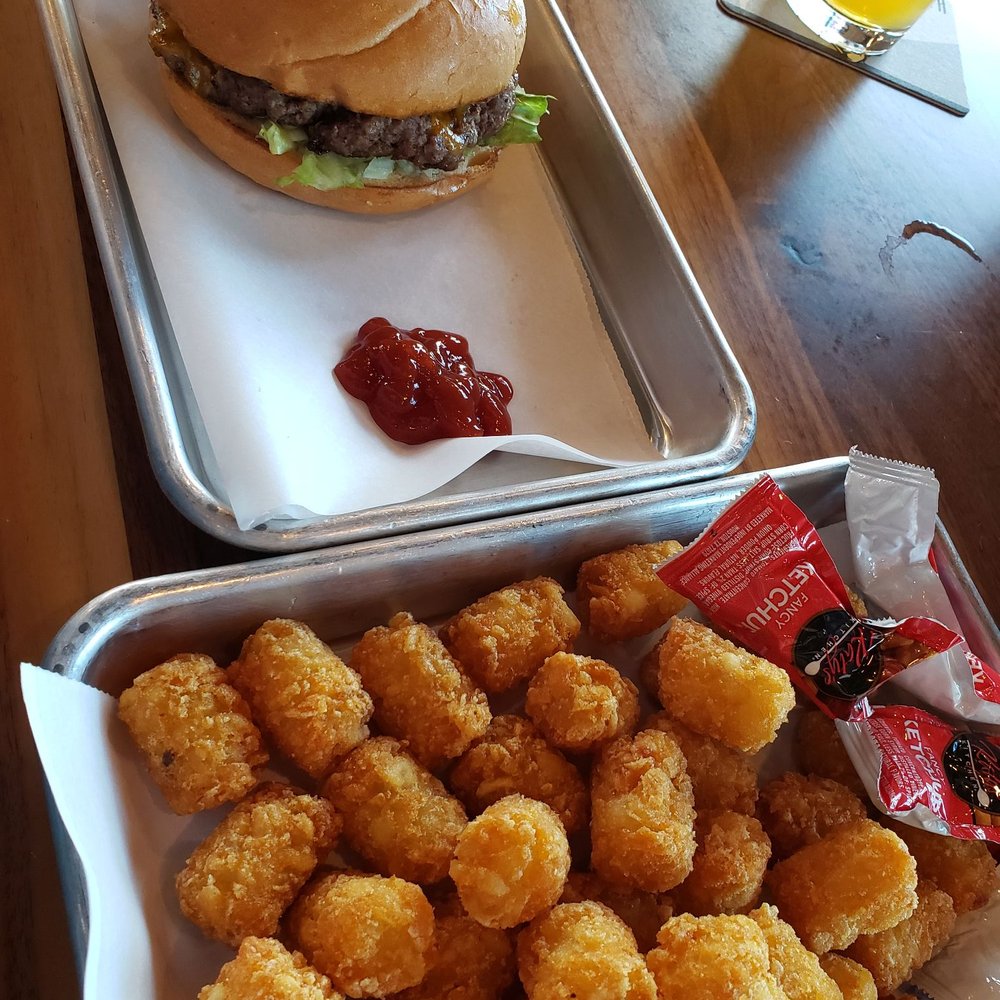 Serial Grillers - The Leatherface Burger with tater tots - Cheesesteaks Near Me - Tucson, Arizona Serial Grillers - The Leatherface Burger with tater tots - Cheesesteaks Near Me - Tucson, Arizona