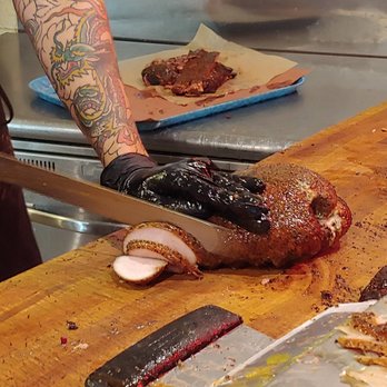 Franklin Barbecue - Slicing the meat - Barbeque Near Me - Austin, Texas