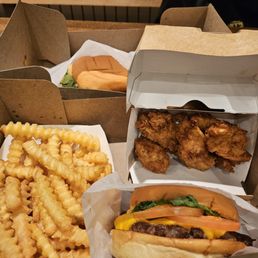 Crinkle cut fries, cheeseburger, and chicken nuggets