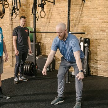 Strength Wise Barbell - Coaching clients in my barbell class - Trainers Near Me - Evanston, Illinois Strength Wise Barbell - Coaching clients in my barbell class - Trainers Near Me - Evanston, Illinois