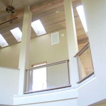 Pacific Property Services - Faye's great-room finished. The peeler poles are boxed in and finished to give the area a sophisticated look - General Contractors Near Me Pacific Property Services - Faye's great-room finished. The peeler poles are boxed in and finished to give the area a sophisticated look - General Contractors Near Me