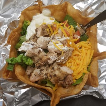 Reggies Music Joint - Chicken taco salad in a huge taco bowl. - Music & DVDs Near Me - Chicago, Illinois