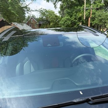 Hertz Rent A Car - Tape permanently stuck to the windshield apparently after a windshield replacement - Car Rental Near Me - Detroit, Michigan