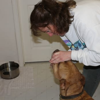 Caring Critter Sitters - Me giving a dog her pills - Pet Sitting Near Me - Fallon, Nevada Caring Critter Sitters - Me giving a dog her pills - Pet Sitting Near Me - Fallon, Nevada