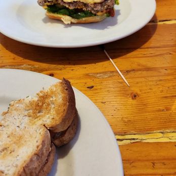 Joe's Friendly Tavern - The partially eaten cheeseburger. - American Near Me - Empire, Michigan Joe's Friendly Tavern - The partially eaten cheeseburger. - American Near Me - Empire, Michigan