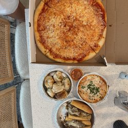 Sergio’s Pizza - Large cheese pizza, Philly cheese steak, garlic knots, and ziti pasta