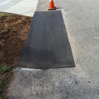 LG Dirtbusters - a road with a cone on it - Masonry/Concrete Near Me - Sumter, South Carolina LG Dirtbusters - a road with a cone on it - Masonry/Concrete Near Me - Sumter, South Carolina