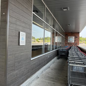 ALDI - a row of shopping carts outside a store - Grocery Near Me - East Walpole, Massachusetts