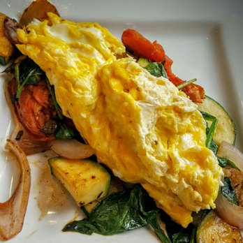 Rooster - Downtown - Scramble egg over potato and vegetables - Creperies Near Me - St. Louis, Missouri Rooster - Downtown - Scramble egg over potato and vegetables - Creperies Near Me - St. Louis, Missouri