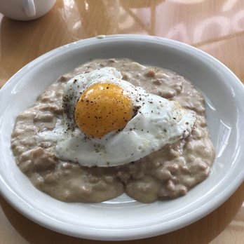 Love Handle - Closer look at the biscuits and gravy - Delis Near Me - Indianapolis, Indiana
