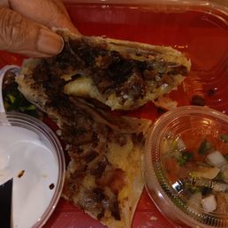 A super dry, hard, salty burnt burrito. Hardly no cheese A super dry, hard, salty burnt burrito. Hardly no cheese