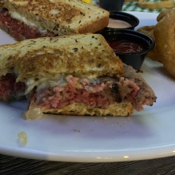 Foxiis Restaurant and Bar - Patty Melt just like I love it! Calamari in background, a little chewy and needs seasoning but still good - New American Near Me - McKinney, Texas Foxiis Restaurant and Bar - Patty Melt just like I love it! Calamari in background, a little chewy and needs seasoning but still good - New American Near Me - McKinney, Texas