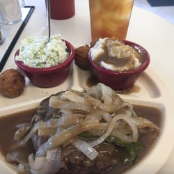 Flat River Cafe - Monday special of hamburger steak, two sides, and rolls or hush puppies. $6.99