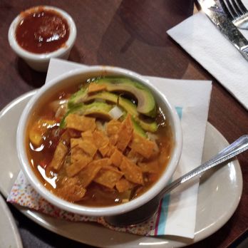 Hugo's Mexican Grill and Cantina - Small Tortilla Soup with vegetables, shredded chicken, cheese, avocado and crispy tortilla strips. $8 - Mexican Near Me - Red Oak, Texas