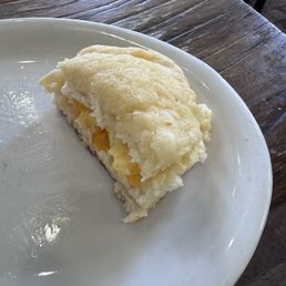 Side of biscuit and egg. Side of biscuit and egg.
