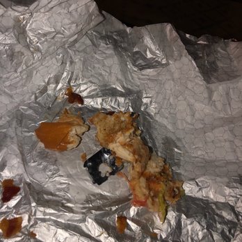 Wendy's - a half eaten piece of pizza on a piece of tin foil - Fast Food Near Me - Daytona Beach, Florida