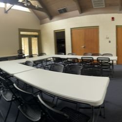 Glen Lake Camp & Retreat Center - Sleeping building's common area. The open doors are the bedrooms. There are 2 on left side of pic.