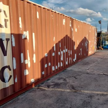 R E Solvers Handymen - Prepping rust on storage container - Handyman Near Me - West Palm Beach, Florida R E Solvers Handymen - Prepping rust on storage container - Handyman Near Me - West Palm Beach, Florida
