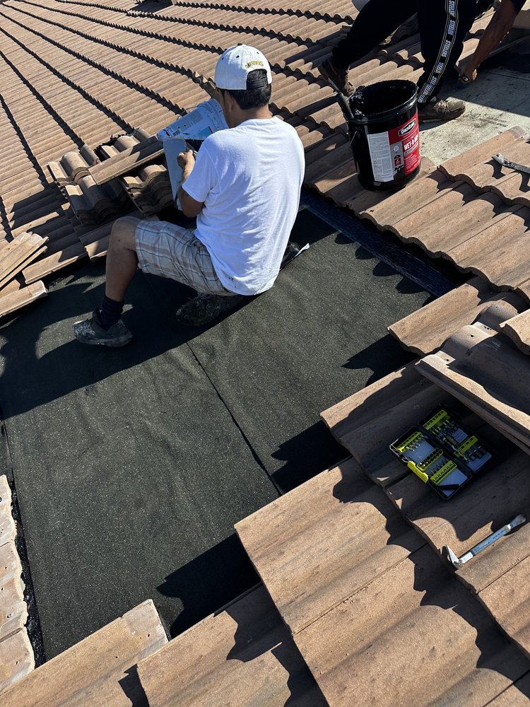 Slide of Tropical Roofing Services