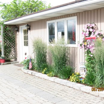 Lee's Landscaping - the front of a home - Landscaping Near Me - Bay Port, Michigan Lee's Landscaping - the front of a home - Landscaping Near Me - Bay Port, Michigan