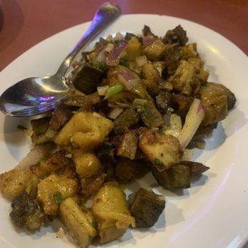 Red Panda Restaurant - a plate of food with a spoon - Himalayan/Nepalese Near Me - Woodside, New York