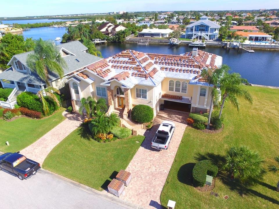 Slide of Suncoast Roofing Solutions