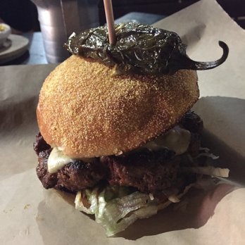Brgr Kitchen Plus Bar - Cinco De Mayo burger: Chorizo & beef patty, cheese, pico de gallo, lettuce, avocado, tortilla strips, corn bun, grilled jalapeno - Burgers Near Me - Kansas City, Missouri