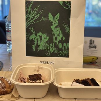 Wildland - Almond croissant Tiramisu and Hazelnut chocolate layer cake - Italian Near Me - Carlsbad, California Wildland - Almond croissant Tiramisu and Hazelnut chocolate layer cake - Italian Near Me - Carlsbad, California